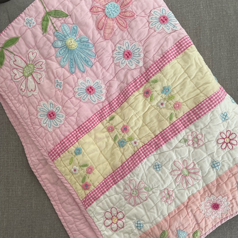 Pottery barn kids floral baby girl crib sheet, quilt and small pillow case.